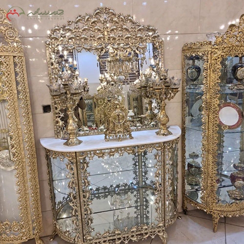 خرید، قیمت و مشخصات آینه کنسول برنز مدرن با طرح بادمجانی و ساعت و شمعدان برنزی زیر قیمت | چترزندگی