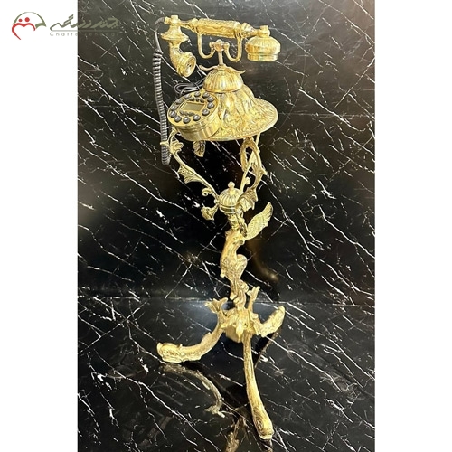 خرید، قیمت و مشخصات تلفن سلطنتی برنزی به روز و شیک طرح ملکه ایستاده بالدار و سبک زیر قیمت | چترزندگی