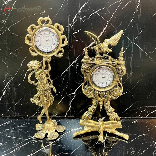 خرید، قیمت و مشخصات ساعت رو میزی برنزی شیک و امروزی طرح عقاب و بانو ایستاده طلایی زیر قیمت | چترزندگی