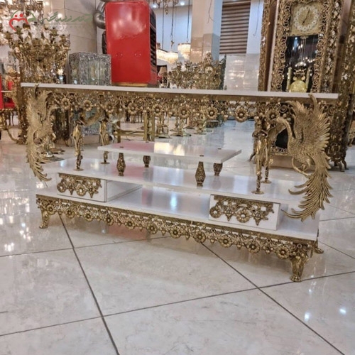 خرید، قیمت و مشخصات میز تلویزیون جنس برنز و ام دی اف کلاسیک و مدرن طرح فرشته بالدار و طاووس زیر قیمت | چترزندگی