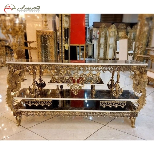 خرید، قیمت و مشخصات میز تلویزیون امروزی و ظریف برنزی و چوب ام دی اف مشکی، طرح طاووس تاجدار زیر قیمت | چترزندگی