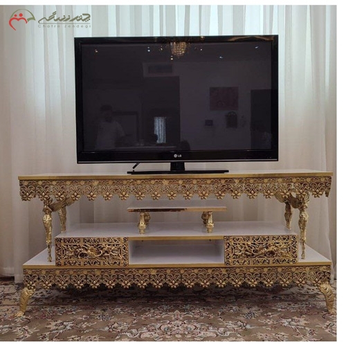 خرید، قیمت و مشخصات میز تلویزیون لوکس و جدید مستطیلی آلیاژی و ام دی اف، کشو بغل طرح ملائکه ایستاده زیر قیمت | چترزندگی