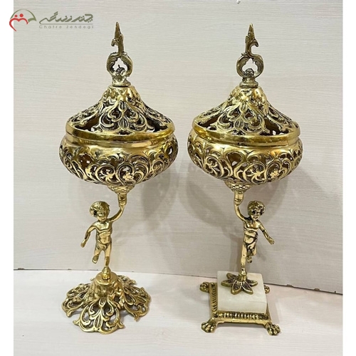 خرید، قیمت و مشخصات شکلات خوری های برنزی توری با پایه های برنز و سنگی ساده و امروزی طرح پسربچه زیر قیمت | چترزندگی