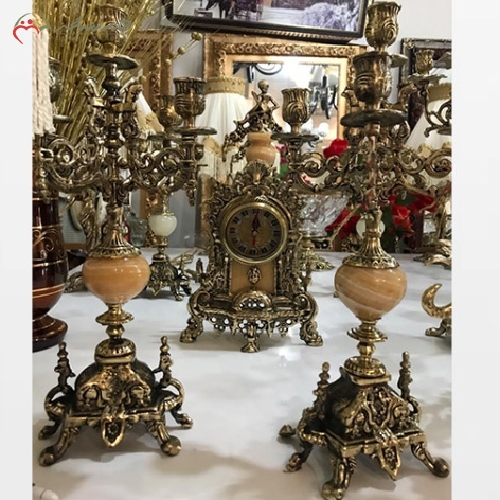 خرید، قیمت و مشخصات ست ساعت و شمعدان کنت رنگ بدنه برنزی سیاه قلم و رنگ سنگ پرتقالی با ضمانت - چتر زندگی