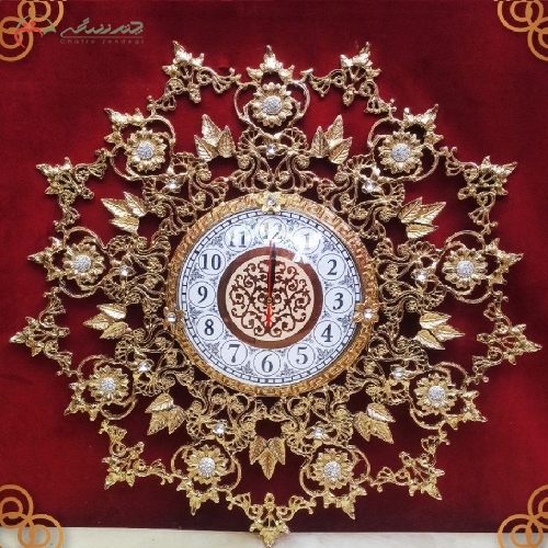 خرید، قیمت و مشخصات ساعت دیواری مدل طاووسی گلبرگ جنس تمام برنجی و طراحی آنتیک - چترزندگی