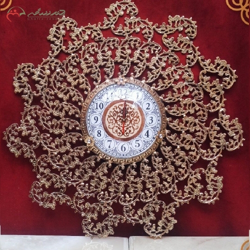 خرید، قیمت و مشخصات ساعت دیواری برنجی طراحی گل پر کار و رنگ ثابت کیفیت بی نظیر تولید - چترزندگی