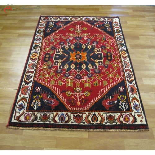 خرید، قیمت و مشخصات فرش دستبافت گبه با زمینه لاکی و حاشیخ های سرمه ای و الیاف طبیعی درجه یک کد 39529 - چترزندگی