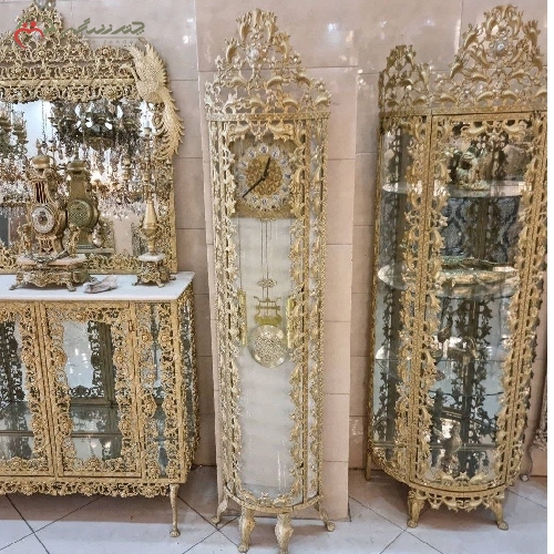 خرید، قیمت و مشخصات ساعت ایستاده طرح بادمجانی و رنگ طلایی بدنه با دوام و رنگ ثابت دارای ضمانت - چترزندگی