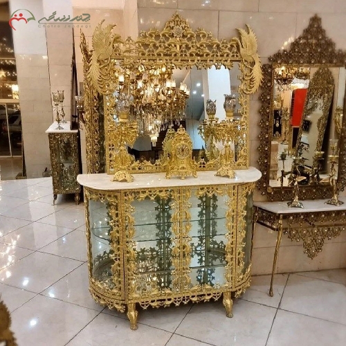 خرید، قیمت و مشخصات ست آینه کنسول بوفه دار با شمعدان و ساعت رومیزی تمام برنزی طرح گل ترمه و طاووس - چترزندگی