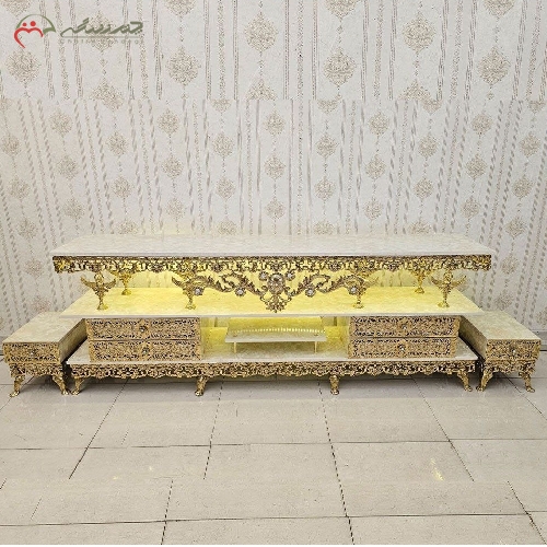 خرید، قیمت و مشخصات میز تلویزیون برنزی چهار کشو به همراه دو عدد جا باندی و طرح بدنه ی گل سرخ با ضمانت رنگ - چترزندگی