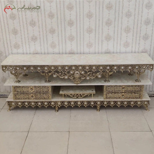 خرید، قیمت و مشخصات میز تلویزیون برنزی مدل آفتابگردان 4 کشو با رویه ام دی اف و گارانتی رنگ بدنه  - چترزندگی