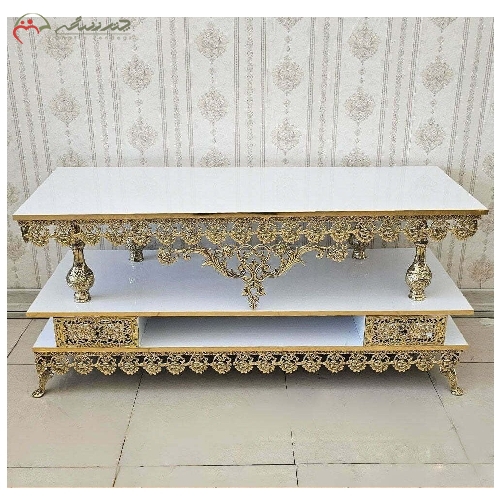 خرید، قیمت و مشخصات میز تلویزیون برنز طرح گل رز و رویه ام دی اف به رنگ طلایی، همراه 2 عدد کشوی برنز کاری شده - چترزندگی