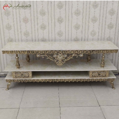 خرید، قیمت و مشخصات میز تلویزیون برنزی پایه دار ( 2 طبقه ) طراحی گل رز بزرگ با رویه ام دی اف و گارانتی محصول - چترزندگی