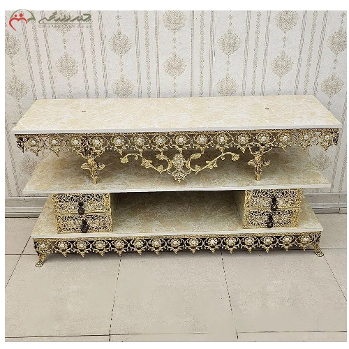 خرید، قیمت و مشخصات میز تلویزیون برنزی 4 کشو رویه هایگلس طرح سنگ مرمر با بدنه ی آفتابگردان - چترزندگی