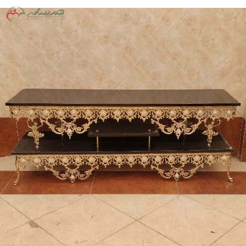 خرید، قیمت و مشخصات میز تلویزیون برنزی با طراحی بی نظیر آفتابگردان در 2 طبقه ی میز با رویه هایگلس مشکی - چترزندگی