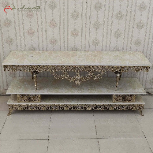 خرید، قیمت و مشخصات میز تلویزیون برنزی 2 کشو بدنه ظریف کاری شده طرح گل رز و فرشته در ستون ها با ضمانت - چترزندگی