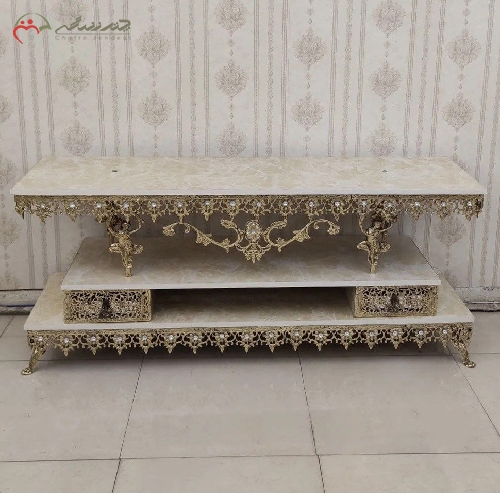 خرید، قیمت و مشخصات میز تلویزیون 2 کشو تمام برنزی با رویه هایگلس و پایه های طرح بانو با ضمانت رنگ بدنه - چترزندگی