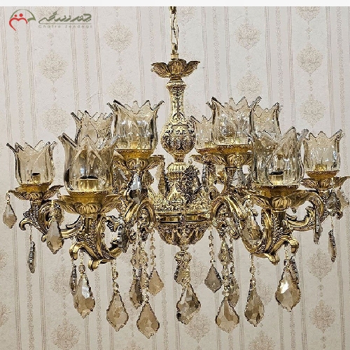 خرید، قیمت و مشخصات لوستر برنزی طرح آرامیس 12 شعله با رنگ طلایی فورتیک و طراحی شیک و مدرن با ضمانت - چترزندگی