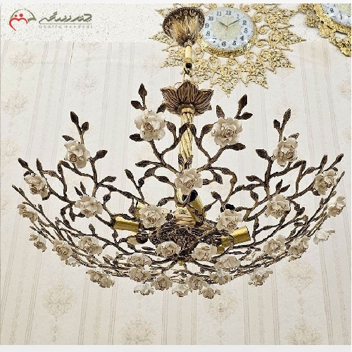 خرید، قیمت و مشخصات لوستر برنزی 8 شعله طرح درختی، بدنه ی ظریف و زیبا به رنگ فورتیک دارای گارانتی رنگ و دوام بدنه - چترزندگی