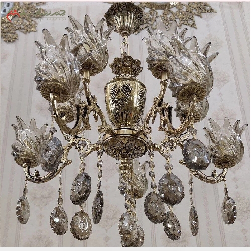 خرید، قیمت و مشخصات لوستر برنزی 10 شعله طرح دو گل کوچک با رنگ بدنه ی آنتیک و کریستال های تزیینی در سر شاخه - چترزندگی