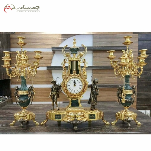 خرید، قیمت و مشخصات ست ساعت رومیزی و شمعدان های برنزی به رنگ طلایی فورتیک با ضمانت دوام بدنه و رنگ محصول کد 444 - چترزندگی