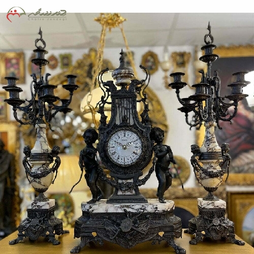 خرید، قیمت و مشخصات ساعت شمعدان برنزی، رنگ آنتیک با سنگ ویوله و طراحی شیک و کاربردی با گارانتی کد 465 - چترزندگی