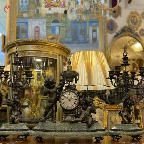 خرید، قیمت و مشخصات ست ساعت رومیزی و شمعدان برنزی با پایه های سنگی و رنگ آنتیک با کیفیت دارای گارانتی کد 431 - چترزندگی