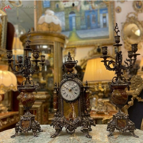 خرید، قیمت و مشخصات ساعت و شمعدان رومیزی برنزی، به رنگ آنتیک و سنگ زرشکی بسیار شیک و ظاهر عالی کد 481 - چترزندگی