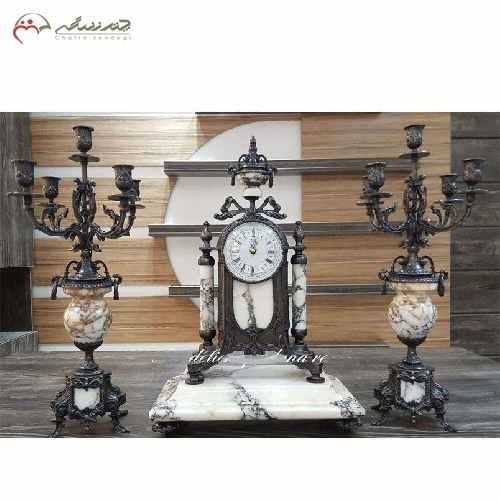 خرید، قیمت و مشخصات ساعت و شمعدان تمام برنزی آنتیک با طراحی کلاسیک، رنگ و بدنه ی بسیار پر کار و با دوام کد 446 - چترزندگی