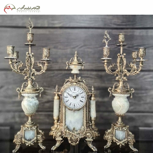 خرید، قیمت و مشخصات ست ساعت رومیزی و شمعدان با بدنه ی برنزی به رنگ فورتیک و طراحی بسیار شیک مناسب دکوراسیون کد 473 - چترزندگی