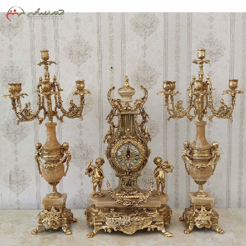 خرید، قیمت و مشخصات ست ساعت و شمعدان برنزی مدل خروسی با رنگ آبکاری شده و سنگ پرتقالی با طراحی بی نظیر کد 426 - چترزندگی