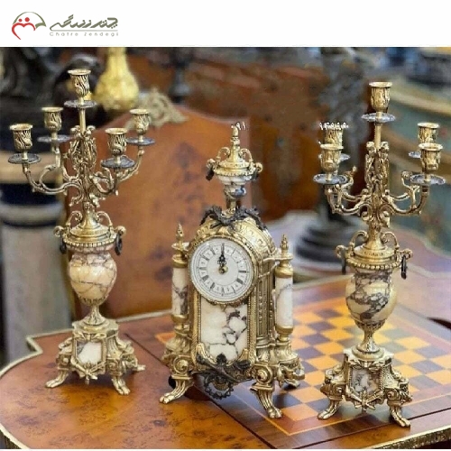 خرید، قیمت و مشخصات ساعت و شمعدان برنزی با سنگ سفید کار شده، طراحی فوق العاده شیک مناسب دکوراسیون کد 742 - چترزندگی