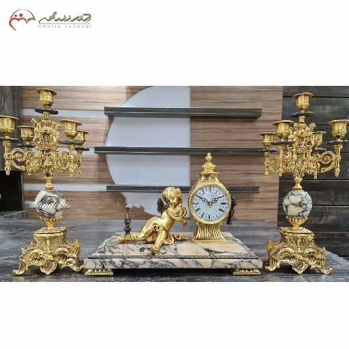 خرید، قیمت و مشخصات ساعت و شمعدان برنزی به رنگ طلایی فورتیک طرح بچه، طراحی و تولید با دقت و ظرافت بالا کد 440 - چترزندگی