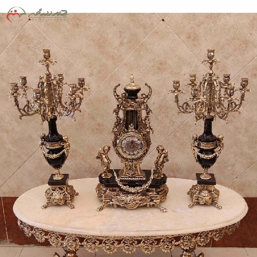 خرید، قیمت و مشخصات ساعت و شمعدان رومیزی از جنس برنز و سنگ مشکی کار شده با طراحی کلاسیک و دارای ضمانت کد 401 - چترزندگی