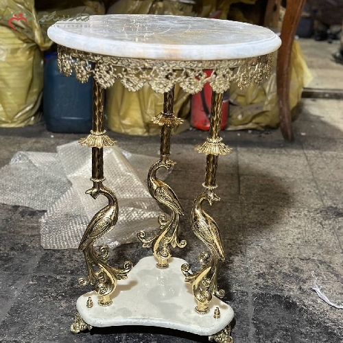 خرید، قیمت و مشخصات میز برنزی طرح درنا با رویه ی سنگ مرمر و حاشیه ی طرح دار، تولید شده با ظرافت و دقت بالا دارای ضمانت - چترزندگی