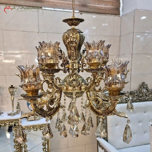 خرید، قیمت و مشخصات لوستر برنزی 5 شاخه مدل کلاسیک با بدنه ی پر کار و رنگ ثابت، طراحی بی نظیر بدنه با کیفیت بالا - چترزندگی