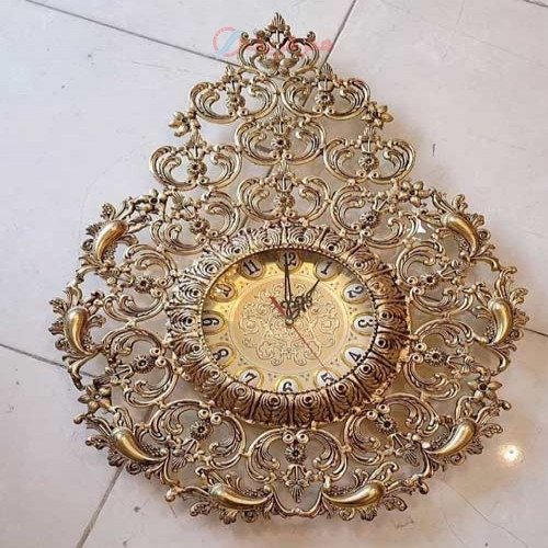 خرید آنلاین، ساعت دیواری مدل قطره آب از جنس آلیاژ آلومنیوم با آبکاری برنز، قیمت مناسب | چترزندگی