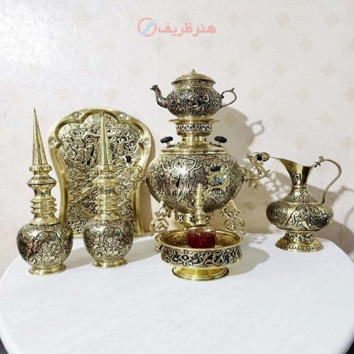 خرید آنلاین، سرویس زیبای سماور 5 لیتری ذغالی برنجی جهان نما دسته توری 3 پایه طرح برگ بزم، سنگین وزن، زیر قیمت بازار | چترزندگی