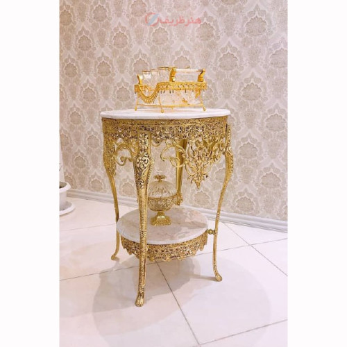 خرید آنلاین، میز خاطره گرد تاج دار شکیل 2 طبقه کار شده با 4 پایه باریک، جنس آلیاژ آلومنیوم آبکاری برنز عرض 50، رنگ ثابت، زیر قیمت بازار | چترزندگی