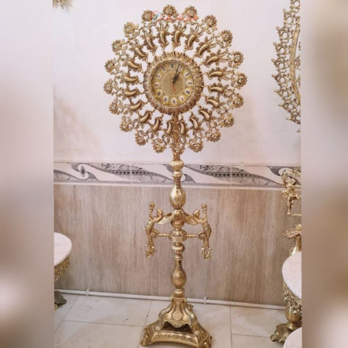 خرید آنلاین، ساعت ایستاده آلیاژ ی آلومنیوم، آبکاری برنز در طرح خورشید با کیفیت اعلاء، قیمت مناسب | چترزندگی