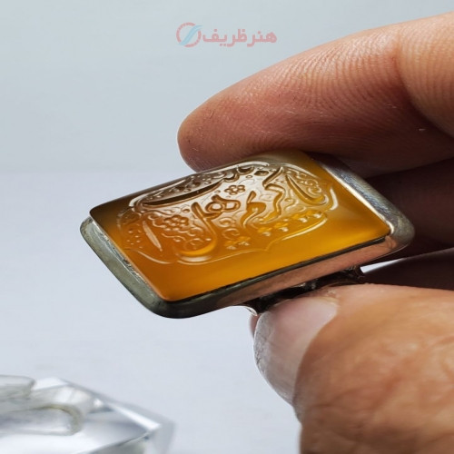 خرید آنلاین، انگشتر مردانه با عقیق هندی تراشکاری شده به شکل مستطیل با درج مهر النور بر روی نگین و رکاب دستساز، زیر قیمت بازار | چترزندگی