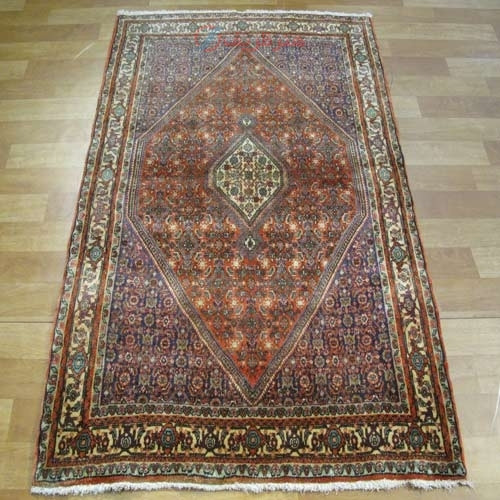 خرید آنلاین، فرش دستباف بيجار با نقشه فوق العاده در طرح لچک و ترن، رنگ زمینه نارنجي با حاشیه كرم کد ۳۹۲۵۳، زیر قیمت بازار | چترزندگی
