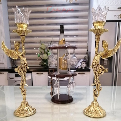 خرید آنلاین، شمعدان آلیاژ آلومنیوم در طرح فرشته بالدار با رنگ ثابت، آبکاری برنز با کیفیت عالی، قیمت مناسب | چترزندگی