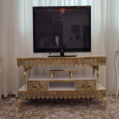 خرید آنلاین، میز تلویزیون در طرح 4 ستون فرشته بالدار، جنس آلیاژ آلومنیوم با طول 120، آبکاری شده با برنز، قیمت مناسب | چترزندگی