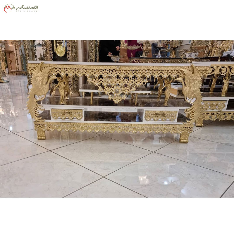 میز تلویزیون آنتیک جنس ام دی اف و برنزی طرح طاووس و گل لاله برجسته - چترزندگی