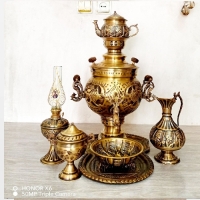 خرید، قیمت و مشخصات ست سماور 7 پارچه ذغالی با قلم زنی برجسته شیر و بدنه توپی شکل و ضمانت دوام بدنه - چترزندگی