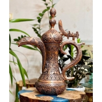 خرید، قیمت و مشخصات دله قهوه عربی قلمزنی شده ی طرح چهره با رنگ مسی بسیار زیبا و بدنه ای از جنس برنج با ضمانت - چترزندگی