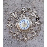 خرید، قیمت و مشخصات ساعت دیواری گرد برنزی حاشیه گل، ارزان و با کیفیت _ چتر زندگی