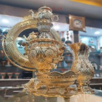 خرید آنلاین، سماور برنجی آبکاری طلای 24 عیار مدل خربزه ای، با نقش و نگاری منحصر به فرد و چشم نواز روکش کوره ای، زیر قیمت بازار | چترزندگی