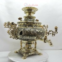 خرید آنلاین، سماور 8 لیتری برنجی زغالی با پایه های شکیل، مدل عدسی قلمزنی شمسه و سیاه قلم بزم و رزم، با کیفیت و دوام بالا، زیر قیمت بازار | چترزندگی